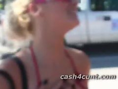 Bikini babe shakes her bare ass for a handful of cash