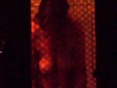 window voyeur (brunette mature in the bathroom)