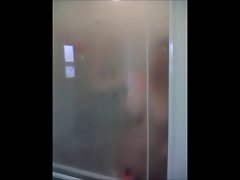 Spy on girl shaving in shower