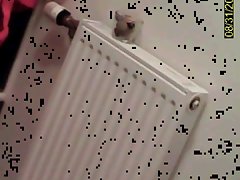 23 yo brunette with huge tits caught by spy cam in bathroom
