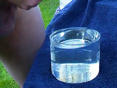 Drooling uncut penis ejaculates under water - big cum shot