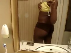 Ebony hottie films herself in the mirror